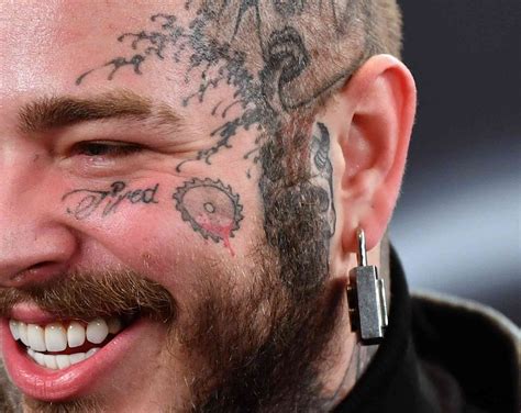 rapper tattoos|A Guide to Post Malones Tattoos and What They Mean